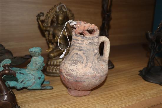 Two brass deities, an Indus Valley? terracotta jug, oil lamps etc